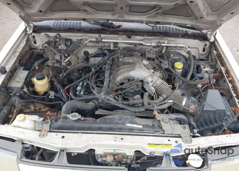 1999 Nissan Frontier Se-V6/Xe-V6 z USA, uszkodzony, nr VIN 1N6ED26Y8XC304170